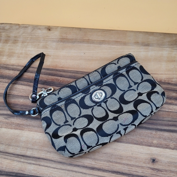 Coach Handbags - Coach Black and Tan Signature Logo Wristlet with Front Pocket
